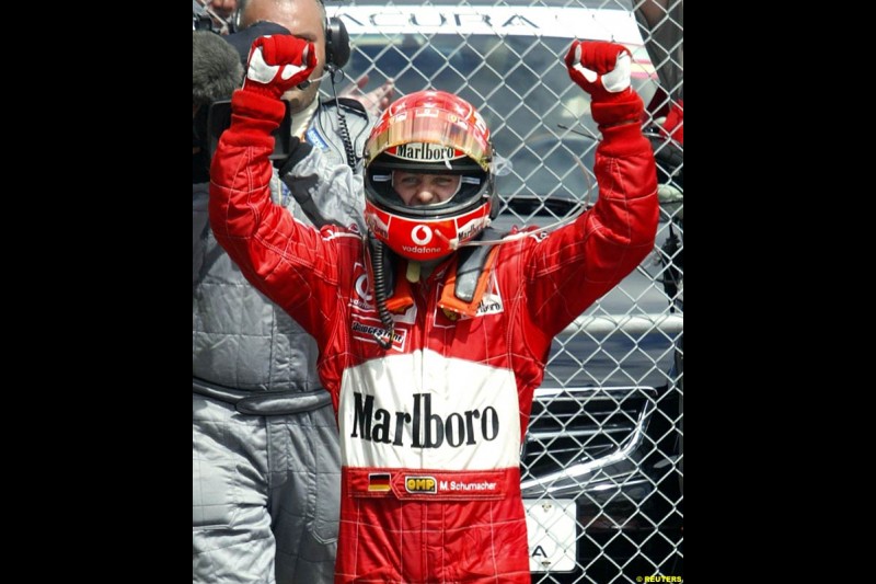 Michael Schumacher, Ferrari, celebrates victory. Canadian Grand Prix, Montreal, Sunday, June 15th 2003.