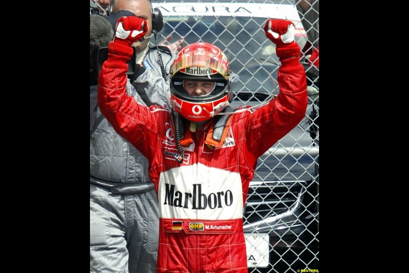 Michael Schumacher, Ferrari, celebrates victory. Canadian Grand Prix, Montreal, Sunday, June 15th 2003.
