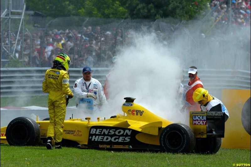 Ralph Firman Jnr, Jordan, stands next to his car after a mechanical failure. Canadian Grand Prix, Montreal, Sunday, June 15th 2003.