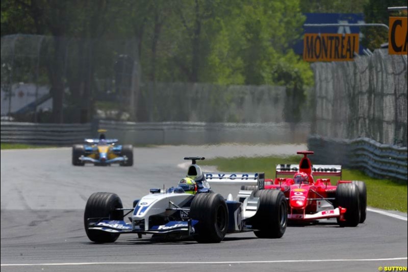 Ralf Schumacher, Williams, leads Michael Schumacher, Ferrari. Canadian Grand Prix, Montreal, Sunday, June 15th 2003.