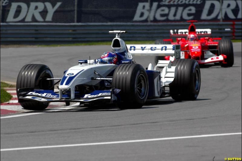 Juan Pablo Montoya, Williams, followed by Michael Schumacher, Ferrari. Canadian Grand Prix, Montreal, Sunday, June 15th 2003.