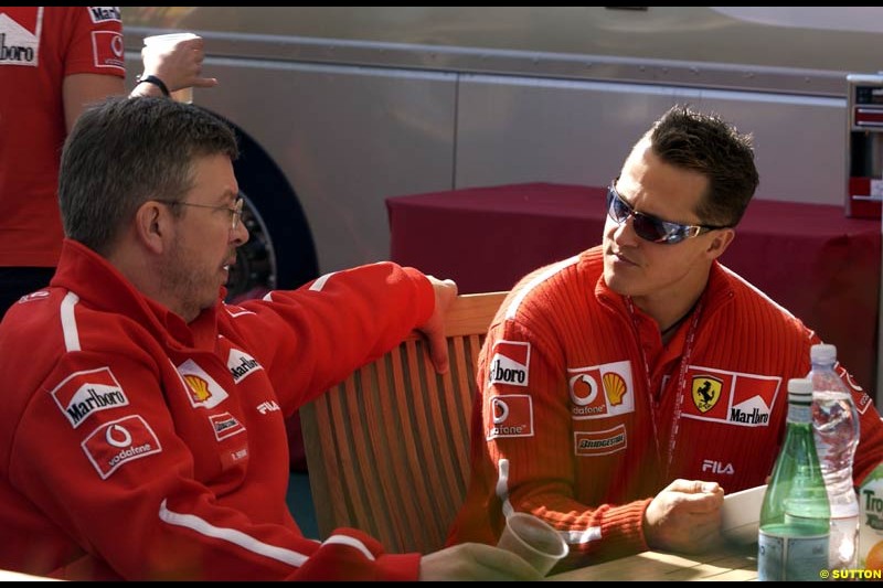 Michael Schumacher, Ferrari, chats to Ross Brawn, Ferrari Technical Director. Canadian Grand Prix, Montreal, Sunday, June 15th 2003.