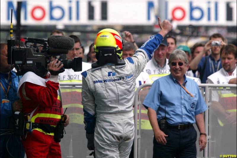 Ralf Schumacher, Williams, celebrates victory. French Grand Prix at Magny Cours. Circuit de Nevers, France. Sunday, July 6th 2003.