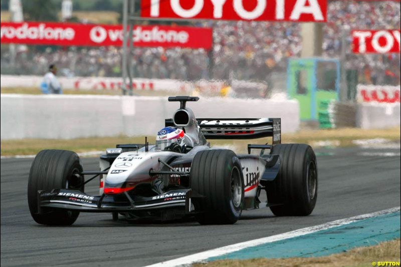 Kimi Raikkonen, McLaren. French Grand Prix at Magny Cours. Circuit de Nevers, France. Sunday, July 6th 2003.