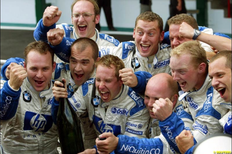 The Williams Team celebrate. French Grand Prix at Magny Cours. Circuit de Nevers, France. Sunday, July 6th 2003.