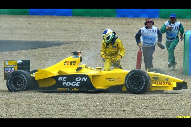 Giancarlo Fisichella, Jordan, steps out of his car. French Grand Prix at Magny Cours. Circuit de Nevers, France. Sunday, July 6th 2003.