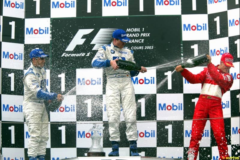 The Podium. 1st, Ralf Schumacher, Williams; 2nd, Juan Pablo Montoya, Williams; 3rd, Michael Schumacher, Ferrari. French Grand Prix at Magny Cours. Circuit de Nevers, France. Sunday, July 6th 2003.