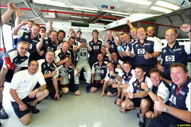 The Williams team celebrates. French Grand Prix at Magny Cours. Circuit de Nevers, France. Sunday, July 6th 2003.