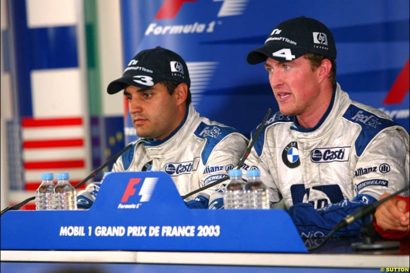 Ralf Schumacher, Williams, along side team mate Juan Pablo Montoya, Williams. French Grand Prix at Magny Cours. Circuit de Nevers, France. Sunday, July 6th 2003.