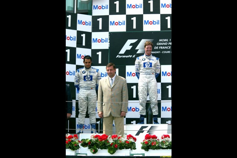 Ralf Schumacher, Williams, along side team mate Juan Pablo Montoya, Williams. French Grand Prix at Magny Cours. Circuit de Nevers, France. Sunday, July 6th 2003.