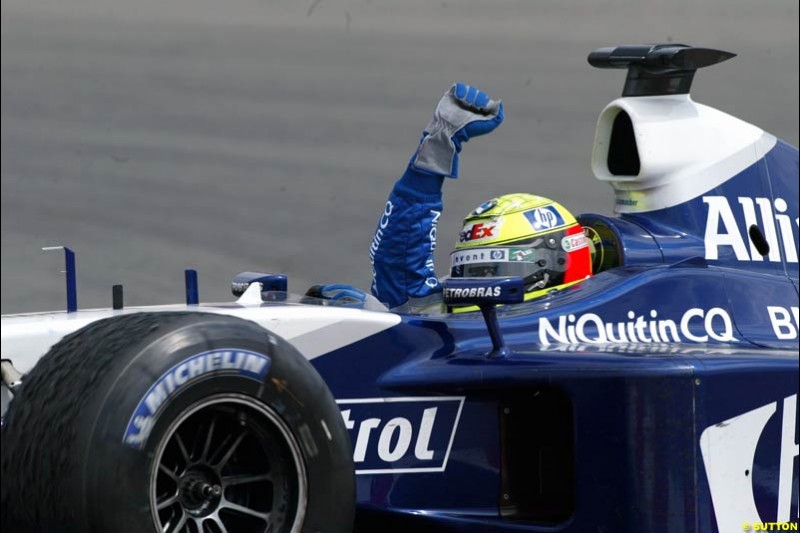 Ralf Schumacher, Williams, celebrates victory. French Grand Prix at Magny Cours. Circuit de Nevers, France. Sunday, July 6th 2003.