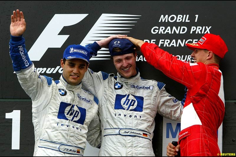 The podium of the French Grand Prix at Magny Cours. Circuit de Nevers, France. Sunday, July 6th 2003.