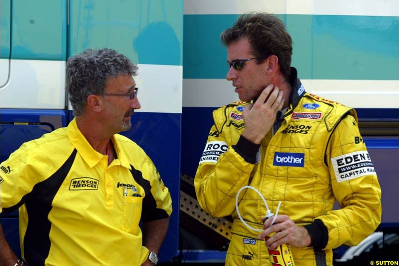 Eddie Jordan, Jordan Team Principle, chats to driver Ralph Firman Jnr. German Grand Prix, Hockenheim, Germany. Saturday, August 2nd 2003.