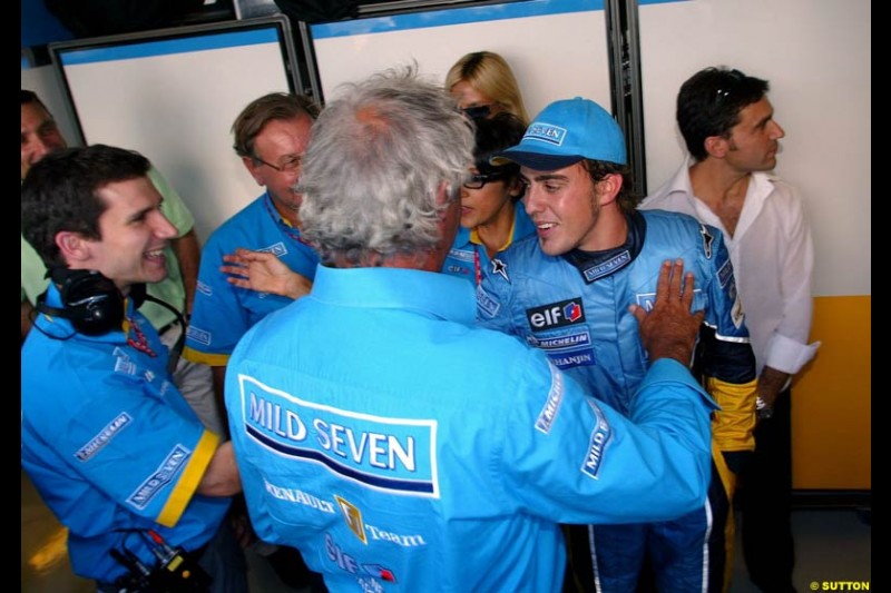 Fernando Alonso, Renault, celebrates pole. Hungarian Grand Prix Saturday. Hungaroring, Budapest. 23rd August, 2003.