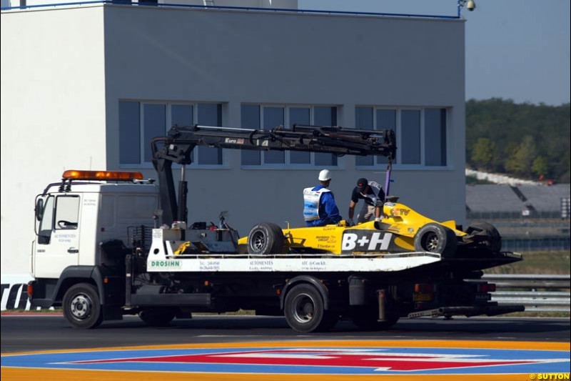 The car of Ralph Firman Jnr is recovered. Hungarian Grand Prix Saturday. Hungaroring, Budapest. 23rd August, 2003.