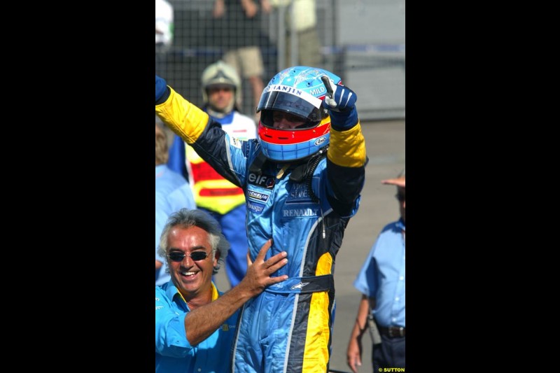 Fernando Alonso, Renault, celebrates victory. Hungarian Grand Prix Sunday. Hungaroring, Budapest. 24th August, 2003.