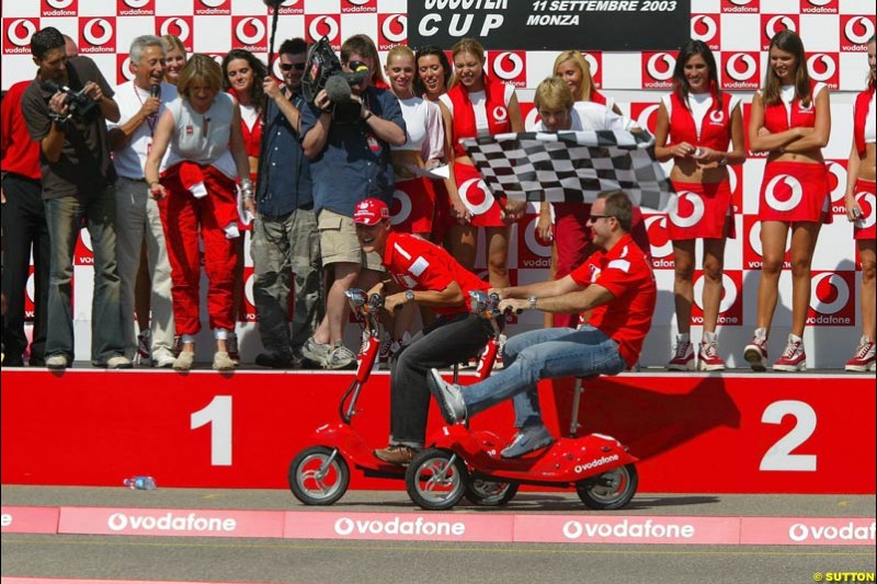 Ferrari scooter event. Italian Grand Prix Friday, Monza, Italy. 12 September 2003.