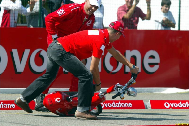 Michael Schumacher, Ferrari, runs into problems. Italian Grand Prix Friday, Monza, Italy. 12 September 2003.