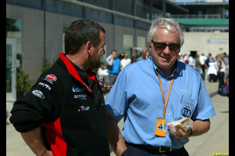 Paul Stoddart and Charlie Whiting. United States GP, Indianapolis Motor Speeway. Thursday, September 25th 2003.