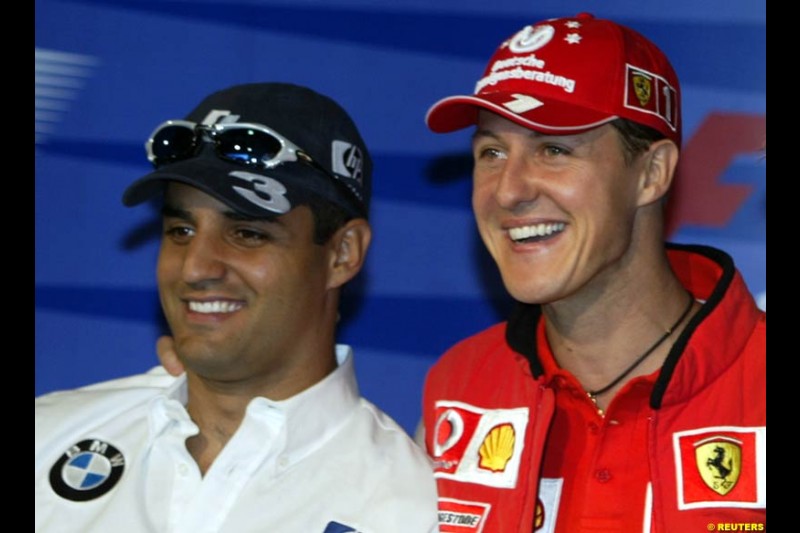 Juan Pablo Montoya and Michael Schumacher. United States GP, Indianapolis Motor Speeway. Thursday, September 25th 2003.