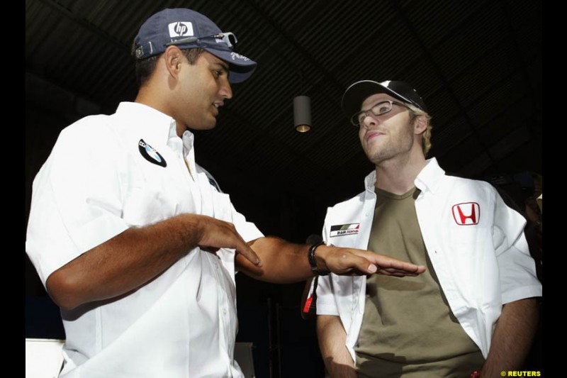 Williams driver Juan Pablo Montoya with BAR driver Jacques Villeneuve. United States GP, Indianapolis Motor Speeway. Thursday, September 25th 2003.