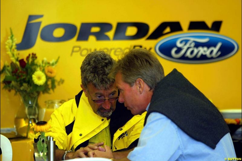 Eddie Jordan and Craig Pollock having breakfast together. United States GP, Indianapolis Motor Speeway. Sunday, September 29th 2003.