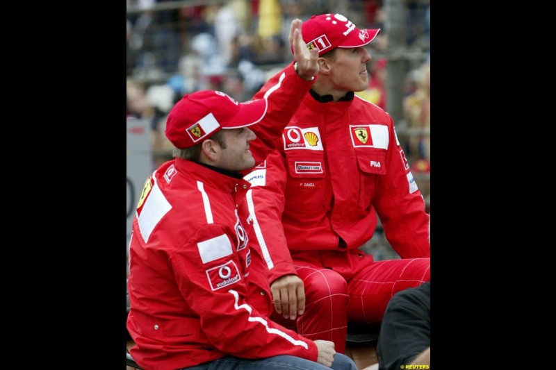 Rubens Barrichello and Michael Schumacher at the drivers' parade. United States GP, Indianapolis Motor Speeway. Sunday, September 29th 2003. 