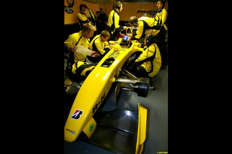 Nick Heidfeld waits to test the new Jordan EJ14 at Silverstone. February 2 2004. 