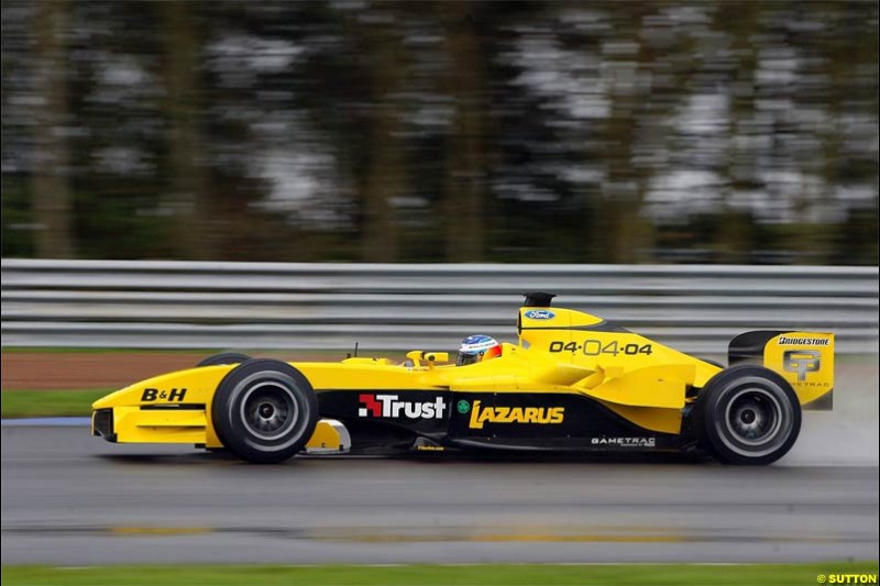 The new Jordan-Ford EJ14 breaks cover at the Silverstone circuit with Nick Heidfeld at the wheel. February 2 2004.