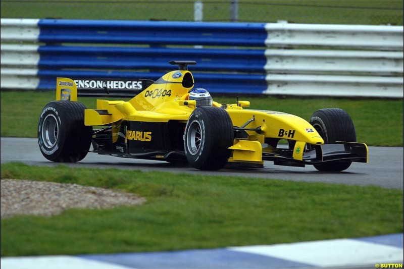The new Jordan-Ford EJ14 breaks cover at the Silverstone circuit with Nick Heidfeld at the wheel. February 2 2004.