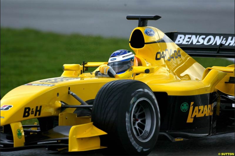The new Jordan-Ford EJ14 breaks cover at the Silverstone circuit with Nick Heidfeld at the wheel. February 2 2004.