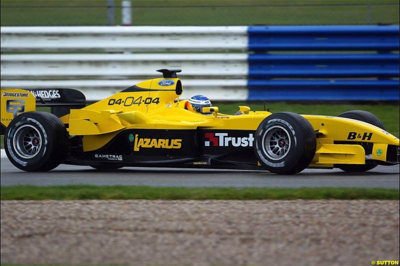 The new Jordan-Ford EJ14 breaks cover at the Silverstone circuit with Nick Heidfeld at the wheel. February 2 2004.