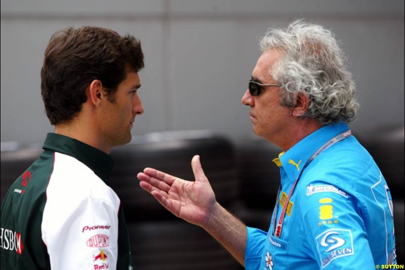 Mark Webber and Flavio Briatore. Saturday qualifying for the Malaysian Grand Prix. Sepang, Kuala Lumpur, Malaysia. March 20th 2004.