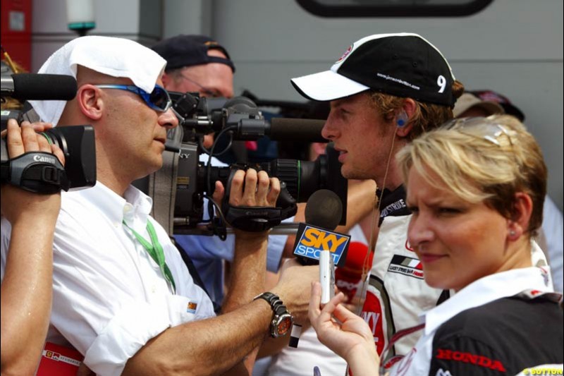Ivan Capelli interviews Jenson Button. Saturday qualifying for the Malaysian Grand Prix. Sepang, Kuala Lumpur, Malaysia. March 20th 2004.