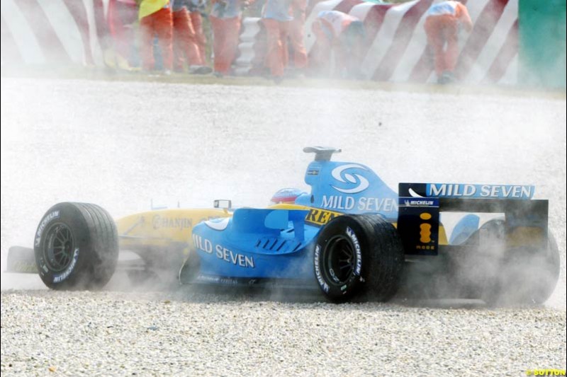 Fernando Alonso, spins off track. Saturday qualifying for the Malaysian Grand Prix. Sepang, Kuala Lumpur, Malaysia. March 20th 2004.