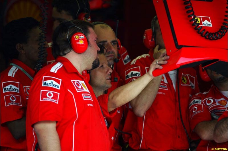 Ferrari mechanics. Saturday qualifying for the Malaysian Grand Prix. Sepang, Kuala Lumpur, Malaysia. March 20th 2004.