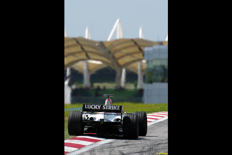 Takuma Sato, BAR. Saturday practice for the Malaysian Grand Prix. Sepang, Kuala Lumpur, Malaysia. March 20th 2004.
