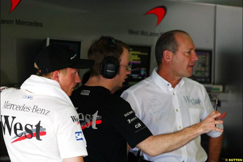 Kimi Raikkonen and Ron Dennis, McLaren. Saturday practice for the Malaysian Grand Prix. Sepang, Kuala Lumpur, Malaysia. March 20th 2004.