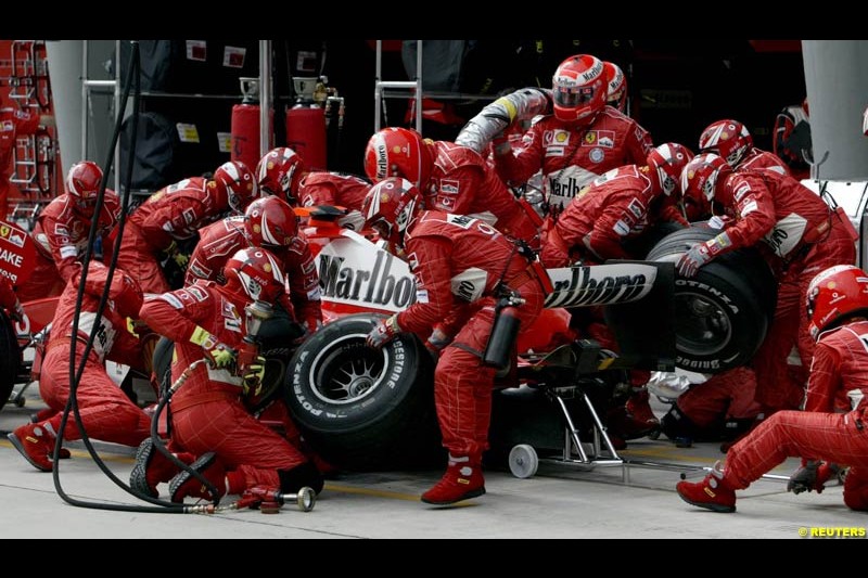 Ferrari pitstop. The Malaysian Grand Prix. Sepang, Kuala Lumpur, Malaysia. March 21st, 2004.