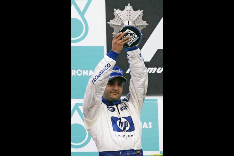 Juan Pablo Montoya, Williams, celebrates second place. The Malaysian Grand Prix. Sepang, Kuala Lumpur, Malaysia. March 21st 2004.