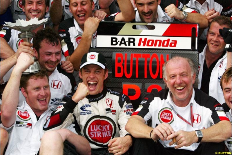 BAR Team Photo. Jenson Button, BAR, celebrates third place. The Malaysian Grand Prix. Sepang, Kuala Lumpur, Malaysia. March 21st 2004.