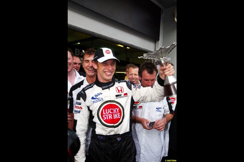 BAR Team Photo. Jenson Button, BAR, celebrates third place. The Malaysian Grand Prix. Sepang, Kuala Lumpur, Malaysia. March 21st 2004.