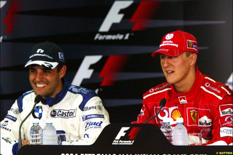 The Post Race Press Conference. 1st, Michael Schumacher, Ferrari; 2nd, Juan Pablo Montoya, Williams. The Malaysian Grand Prix. Sepang, Kuala Lumpur, Malaysia. March 21st 2004.