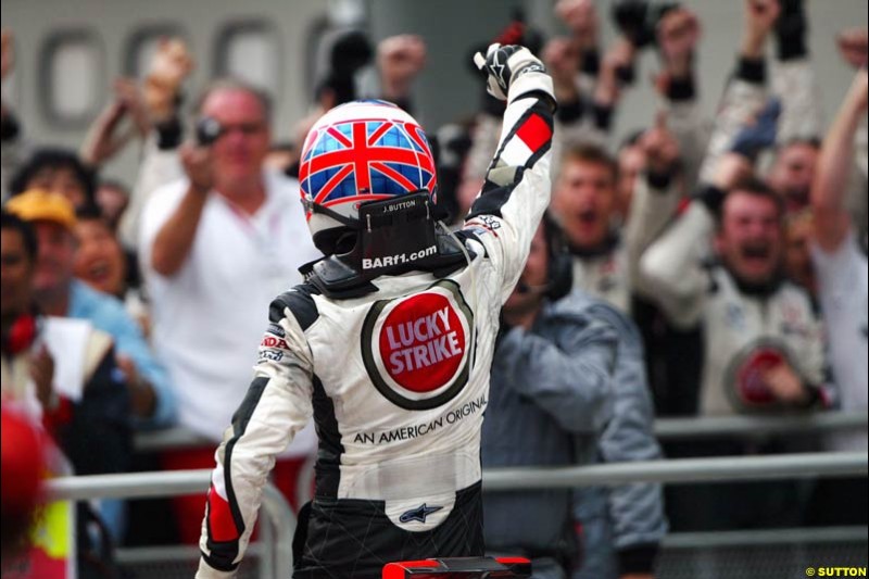 Jenson Button, BAR, celebrates third place. The Malaysian Grand Prix. Sepang, Kuala Lumpur, Malaysia. March 21st 2004.