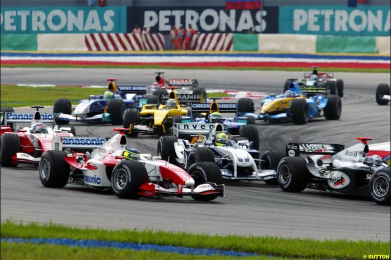 Lap One. The Malaysian Grand Prix. Sepang, Kuala Lumpur, Malaysia. March 21st 2004.