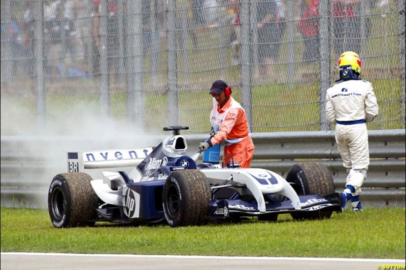 Ralf Schumacher, Williams, after retiring from the race. The Malaysian Grand Prix. Sepang, Kuala Lumpur, Malaysia. March 21st 2004.