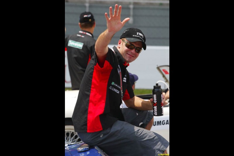 Gianmaria Bruni, Minardi, at the drivers parade. The Malaysian Grand Prix. Sepang, Kuala Lumpur, Malaysia. March 21st 2004. 
