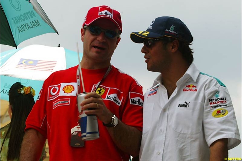 Rubens Barrichello and Felipe Massa at the drivers parade. The Malaysian Grand Prix. Sepang, Kuala Lumpur, Malaysia. March 21st 2004. 
