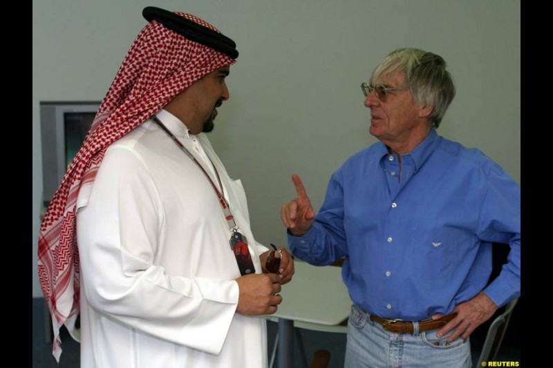 Bernie Ecclestone talks to Bahrain crown Prince Shaikh Salman bin Hamad Al Khalifa. Bahrain Grand Prix, Bahrain International Circuit. April 1st, 2004.