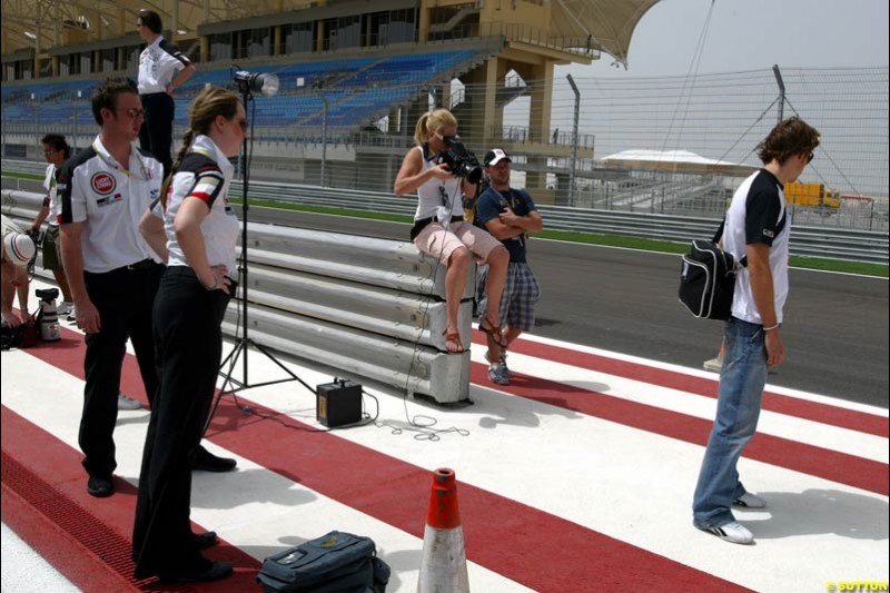Jenson Button BAR takes part in a photoshoot in the pitlane. Bahrain Grand Prix, Bahrain International Circuit. April 1st, 2004.
